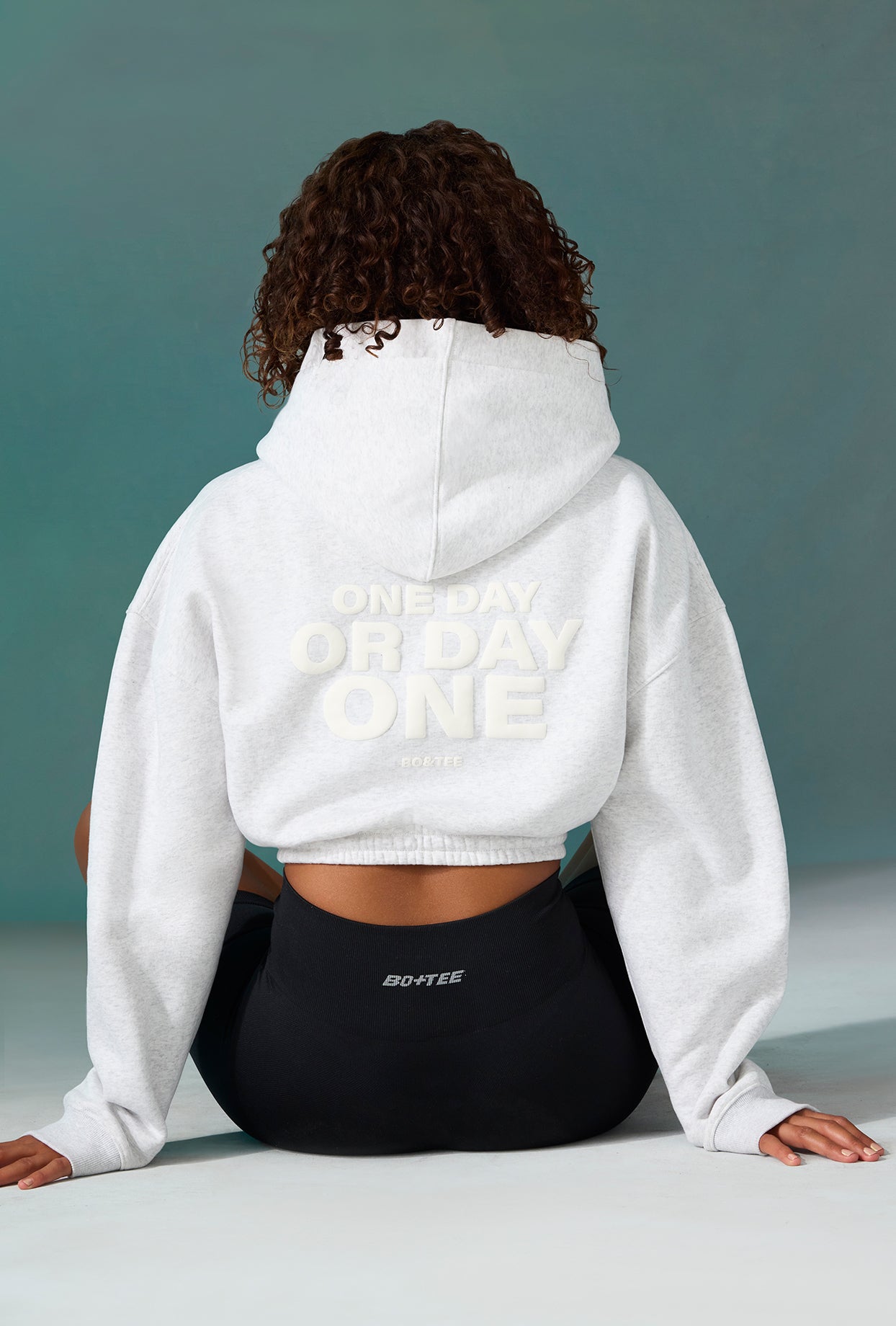 Progess Cropped Drawstring Hooded Sweatshirt in Ice Grey Oh Polly