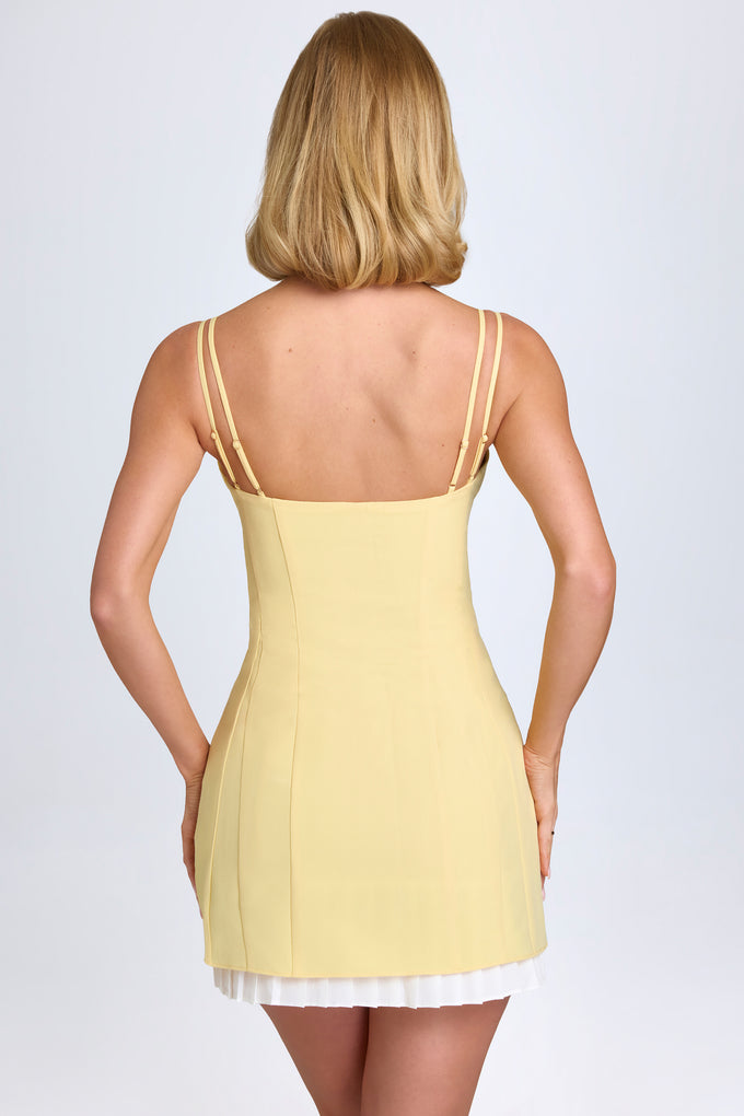 Mini-robe plissée avec nœud, jaune pastel