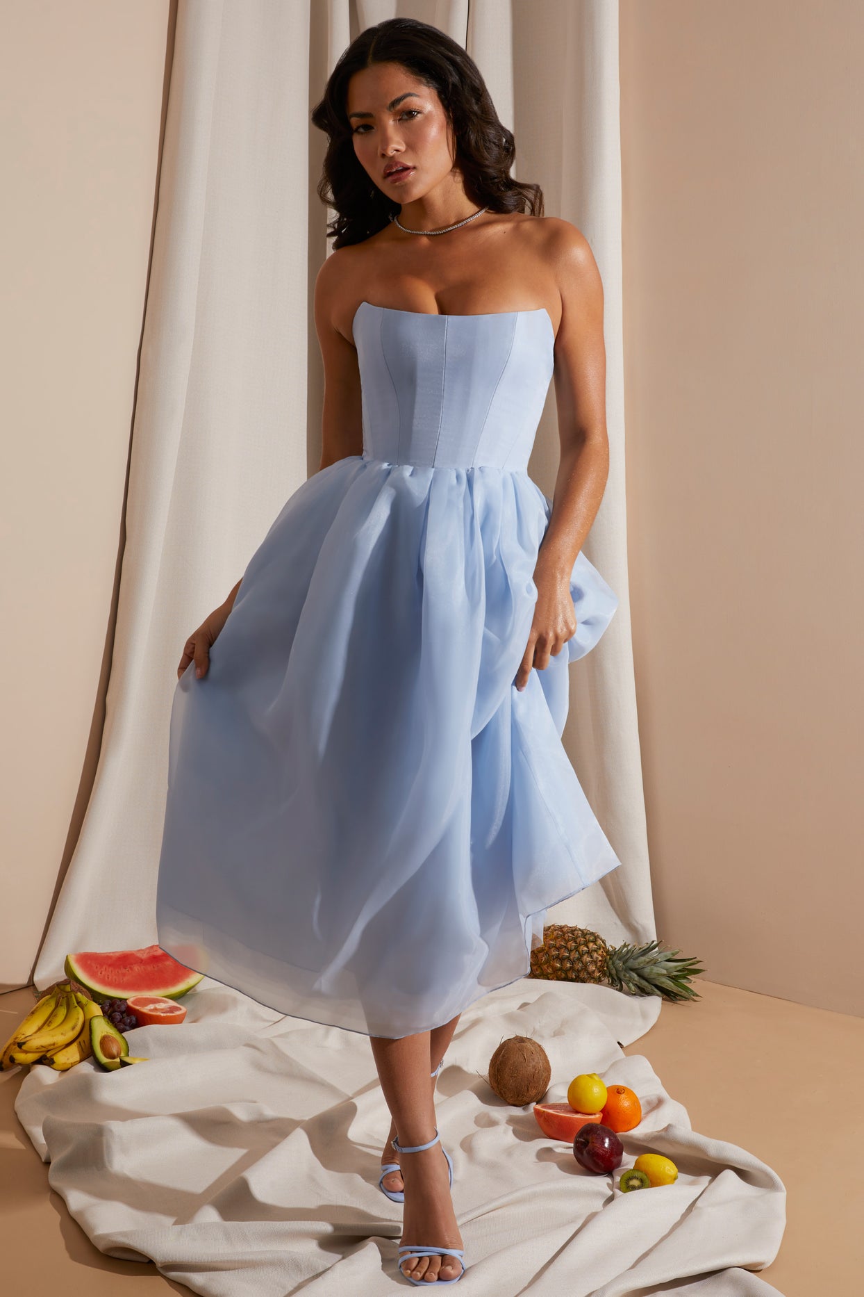 https://www.ohpolly.com/cdn/shop/files/6921_2_Blue-Strapless-Box-Pleat-Midi-Dress.jpg?v=1682612121&width=1244