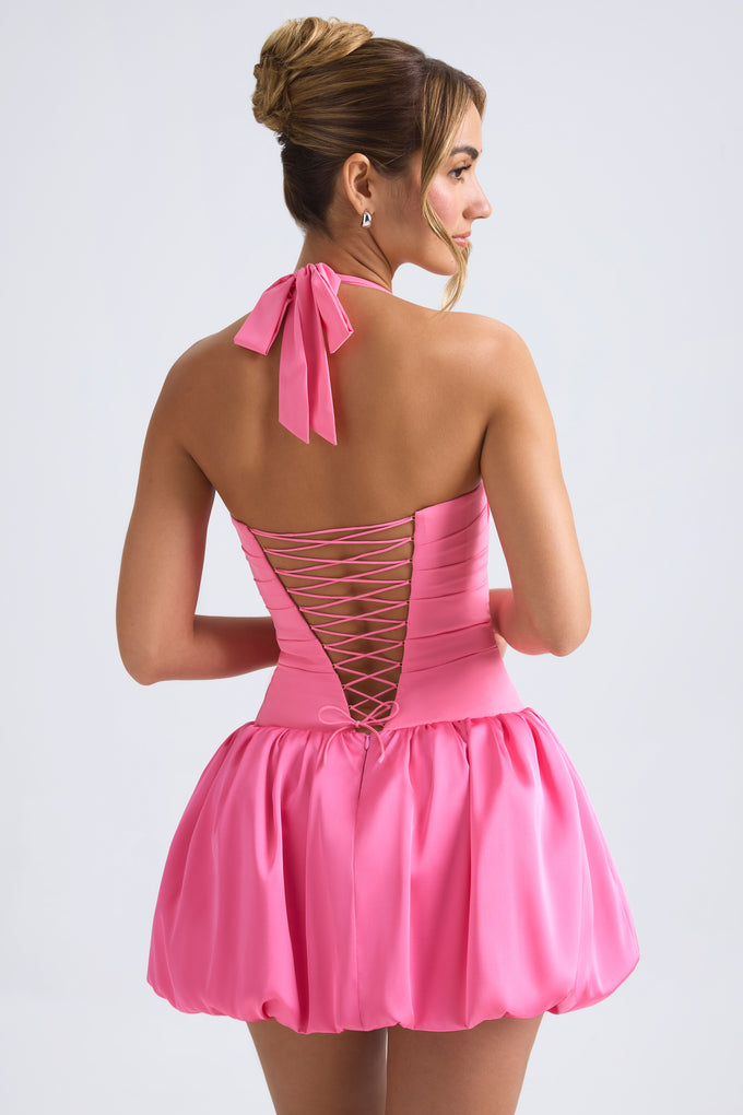 Mini-robe corset à lacets et ourlet bulle à col licou en rose vif