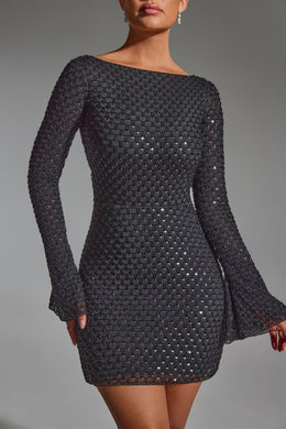 Mini-robe trapèze ornée à dos ouvert en noir