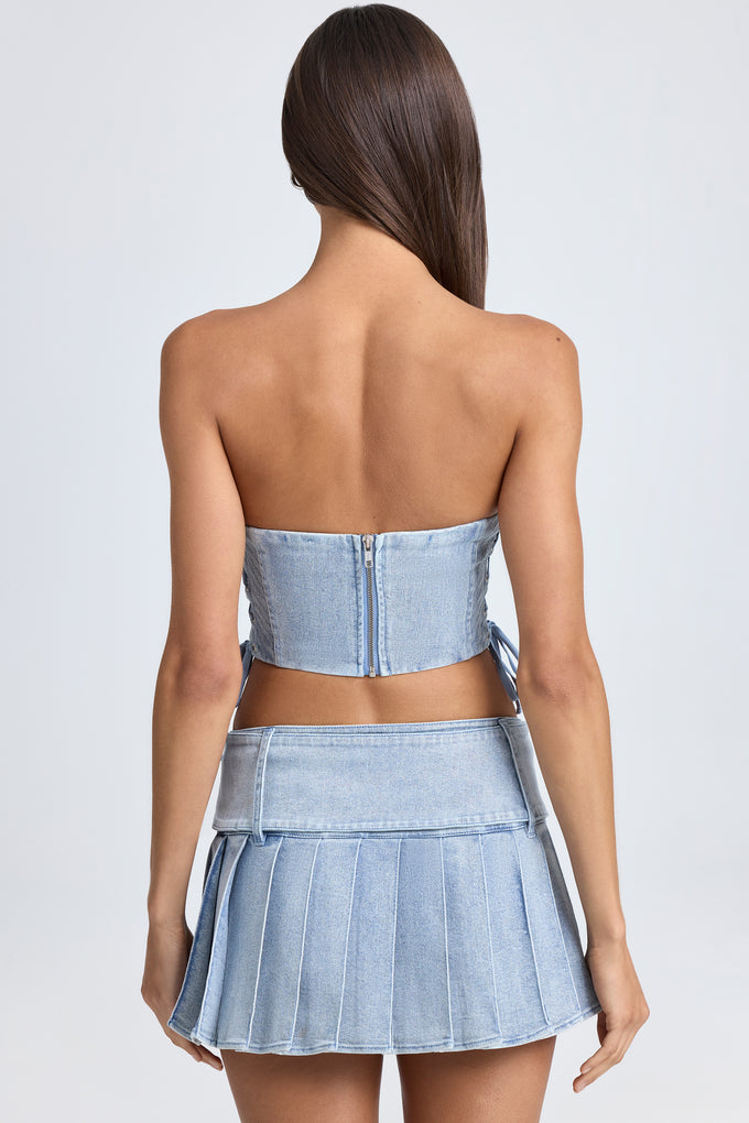 Micro-jupe plissée taille basse avec ceinture en délavage bleu clair
