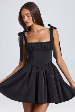 Mini-robe corset drapée en noir