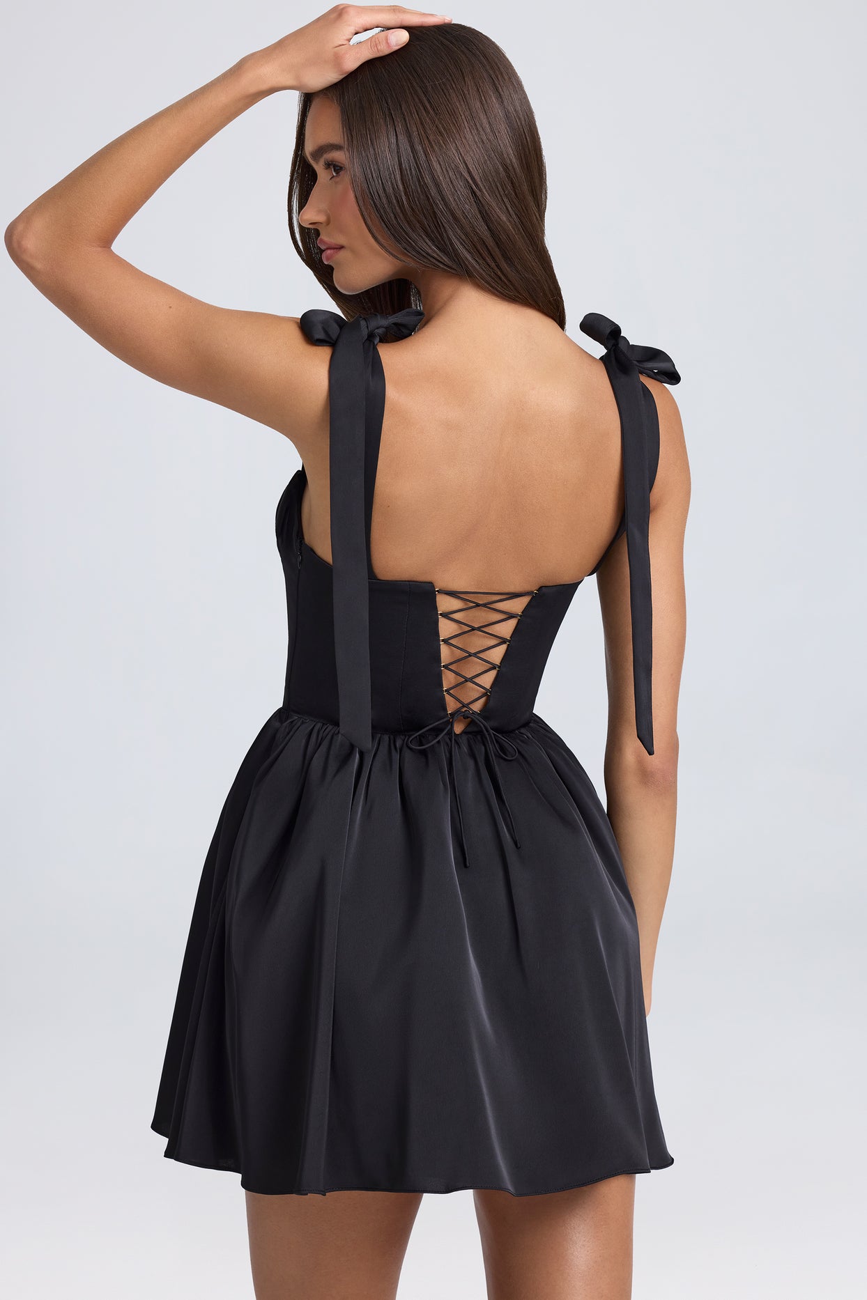 Mini-robe corset drapée en noir