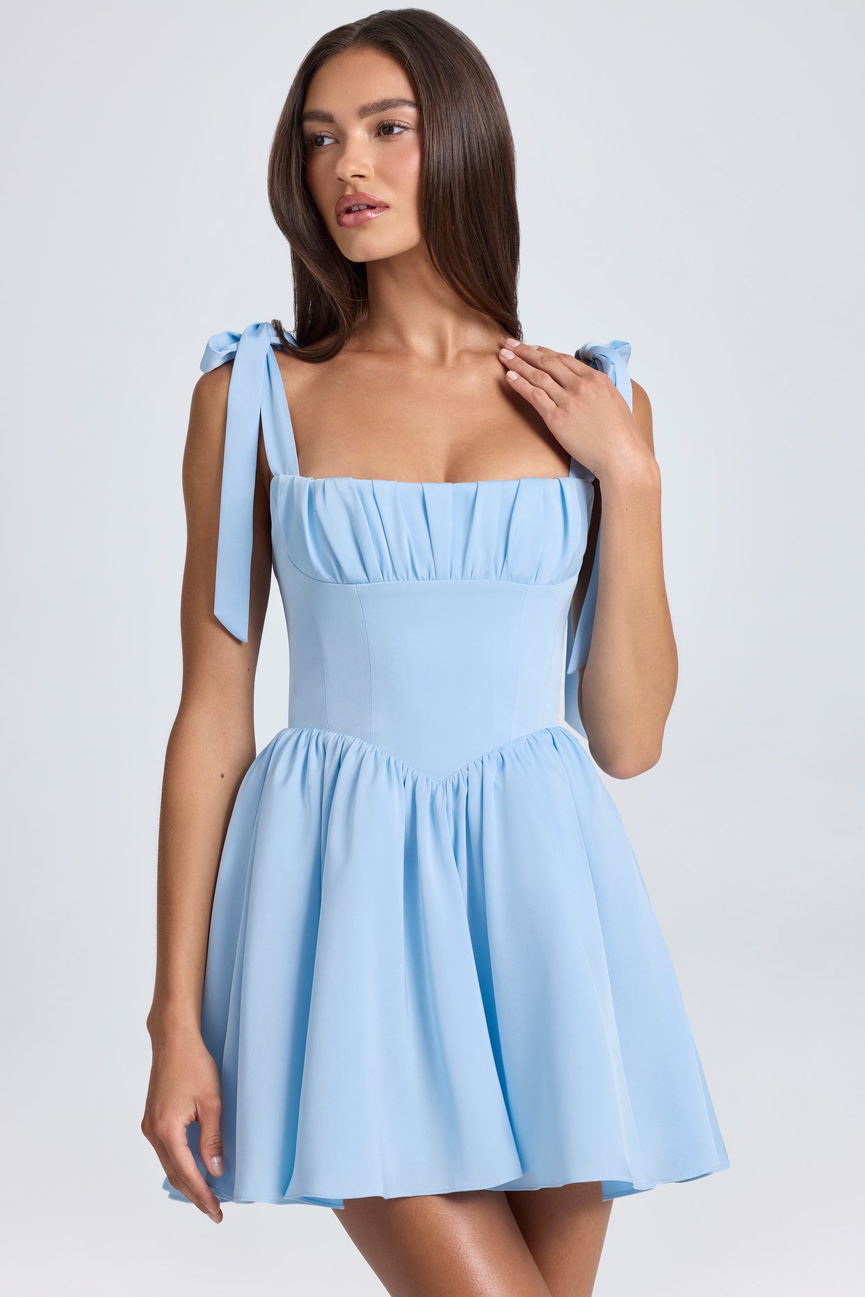 Mini-robe corset drapée en bleu poudre