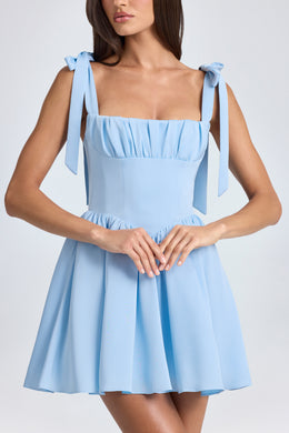 Mini-robe corset drapée en bleu poudre