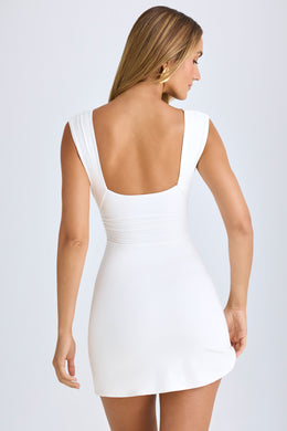 Mini-robe trapèze froncée en modal en blanc