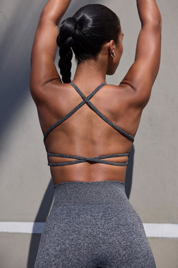 Solid Sports Bra with Striped Overlay Back - Collabor Activewear