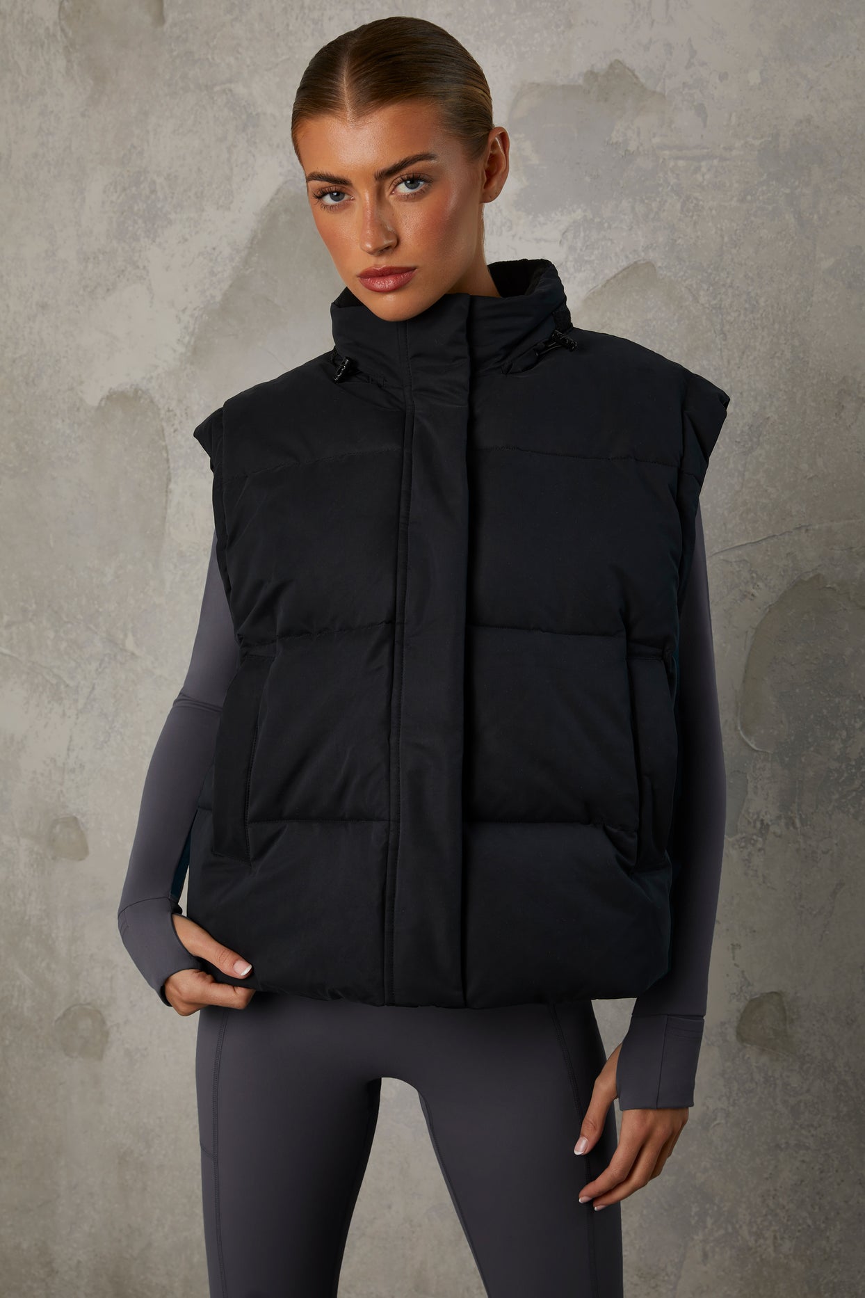 Essential Cropped Puffer Jacket with Detachable Sleeves in Black | Oh Polly
