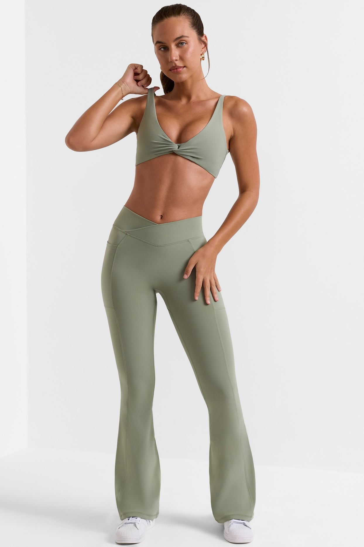 Petite - Leggings avec taille croisée et poches évasées - Vert bambou