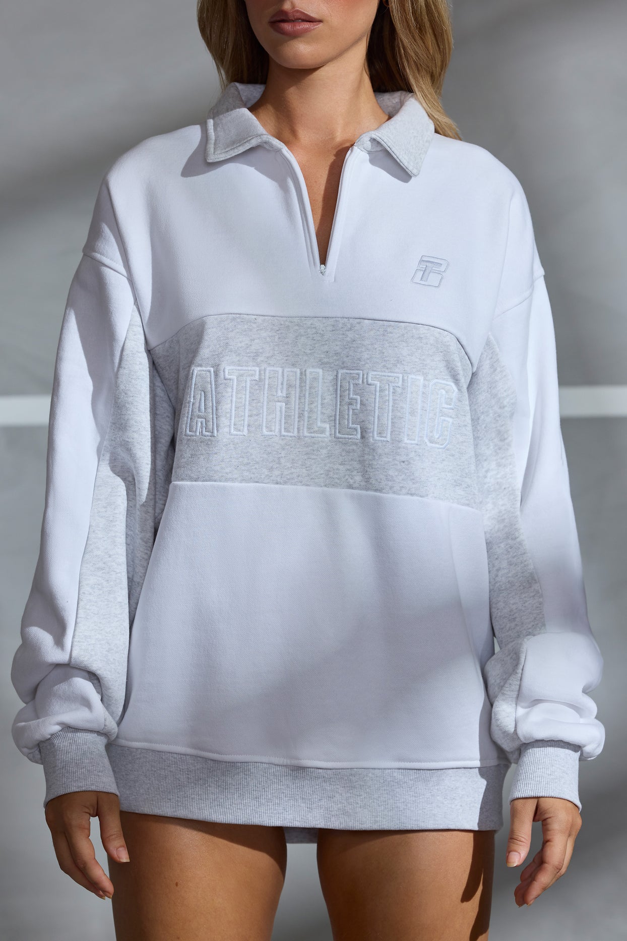 https://www.ohpolly.com/cdn/shop/files/BT0830_8_Athletic-White-Panel-Detail-Zip-Sweatshirt.jpg?v=1693318772&width=1244