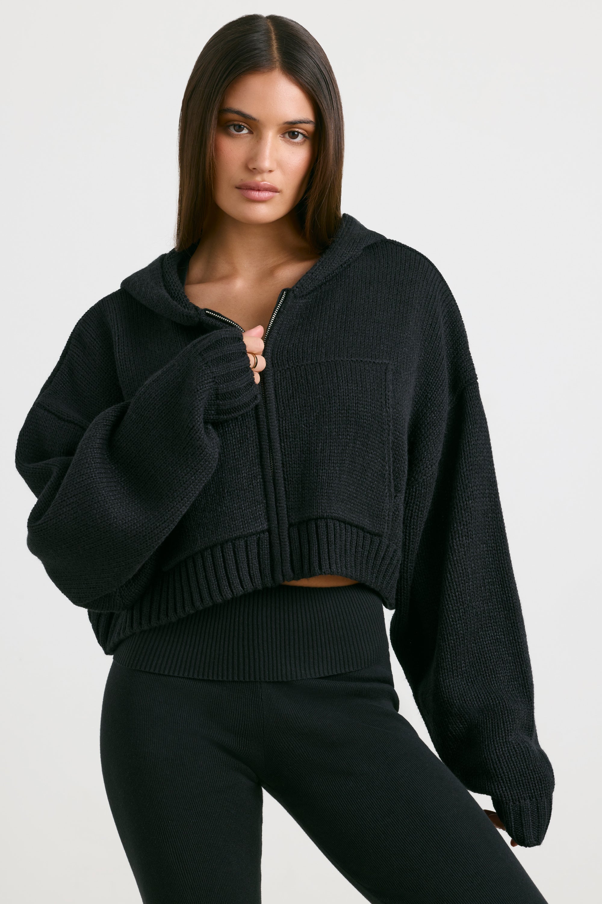 True Cropped Zip Up Chunky Knit Hoodie in Black Oh Polly