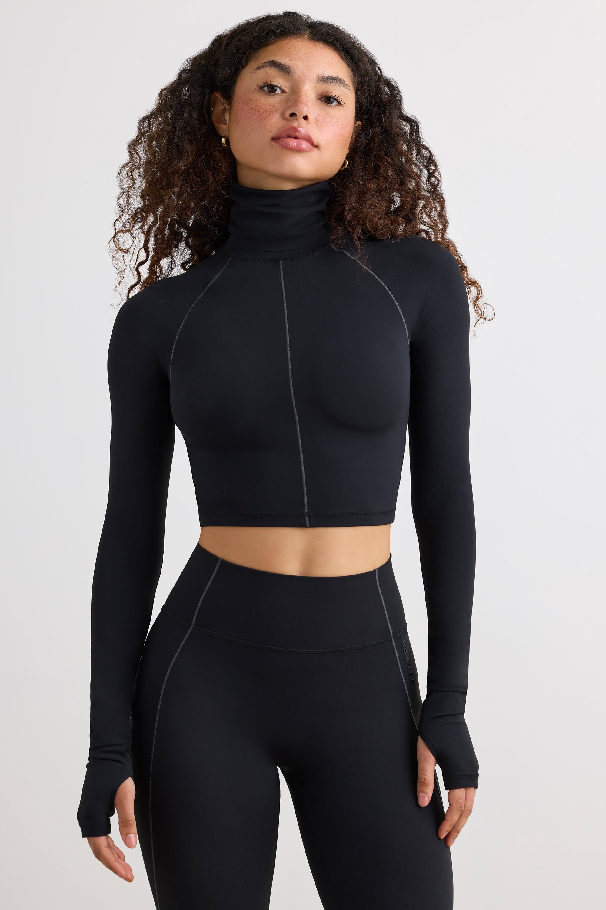 Soft Active Turtleneck Crop Top in Black Oh Polly