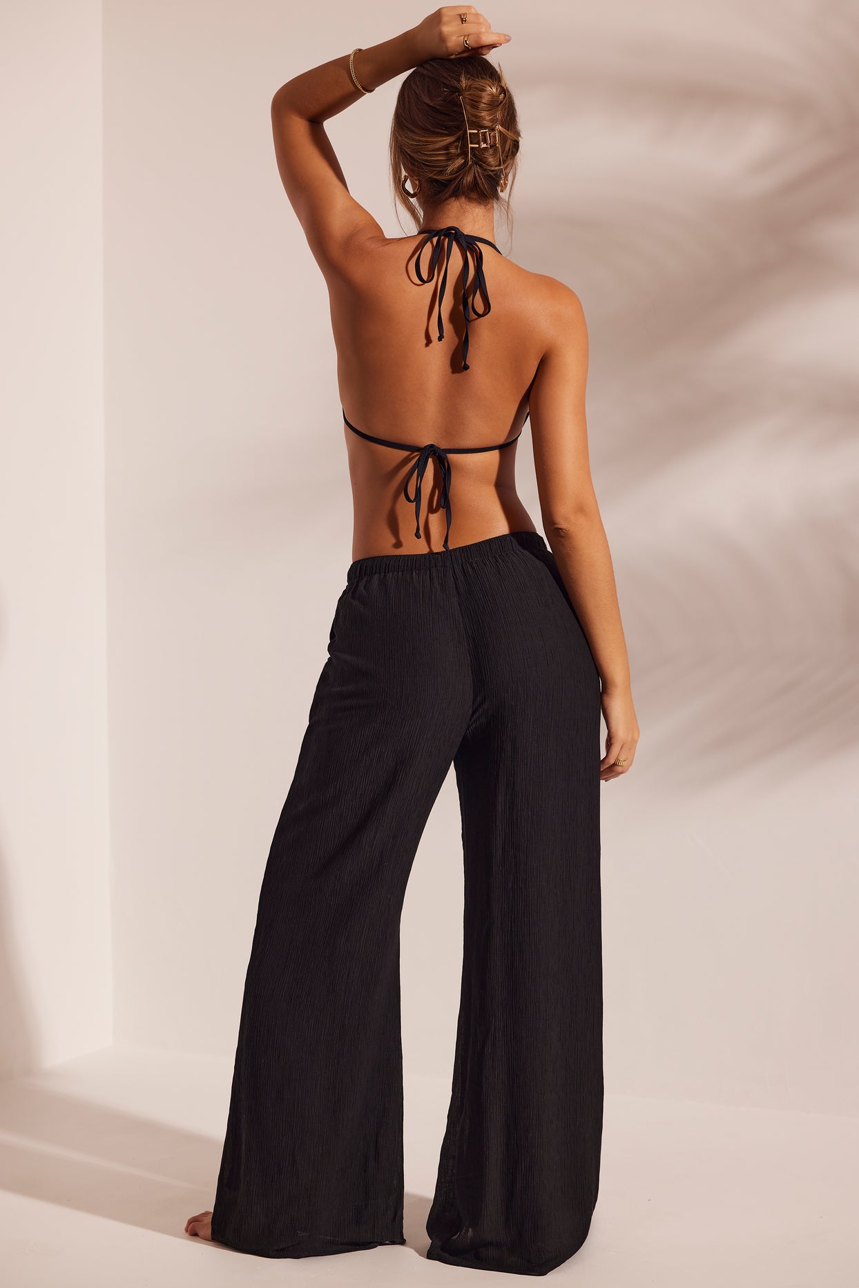 Resort Wear Crinkle Textured Wide Leg Beach Trousers in Black | Oh Polly