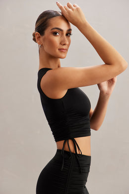 https://www.ohpolly.com/cdn/shop/products/5862_5864_12_Bahiya-Alinta-Black-Tank-Top-Midrise-Skirt-With-Ruched-Sides.jpg?v=1678278039&width=260
