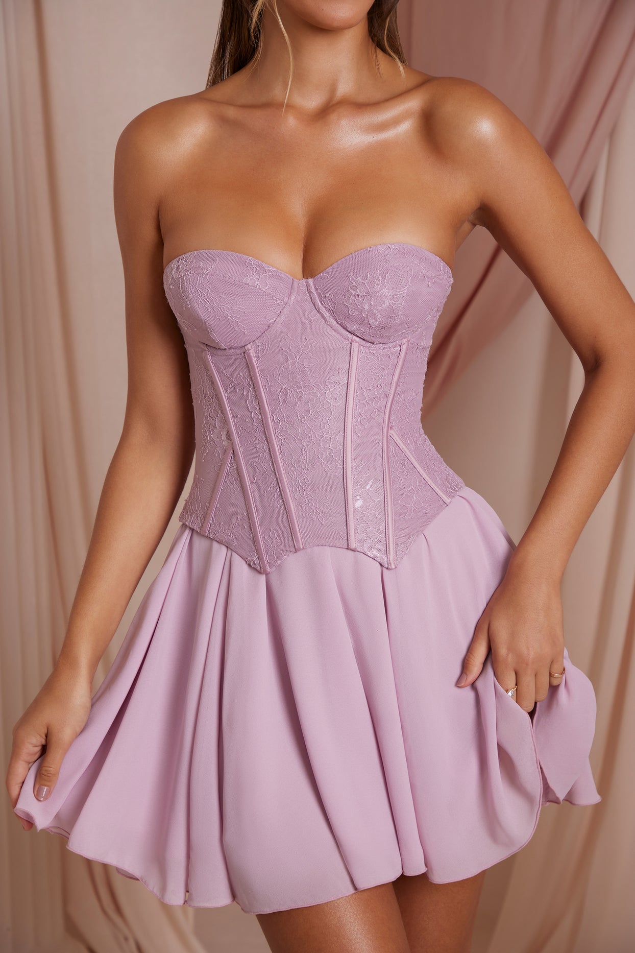 https://www.ohpolly.com/cdn/shop/products/6731_9_Chloe-Dusty-Pink-Strapless-Lace-Corset-With-Circle-Skirt-Mini-Dress.jpg?v=1680169127&width=1244