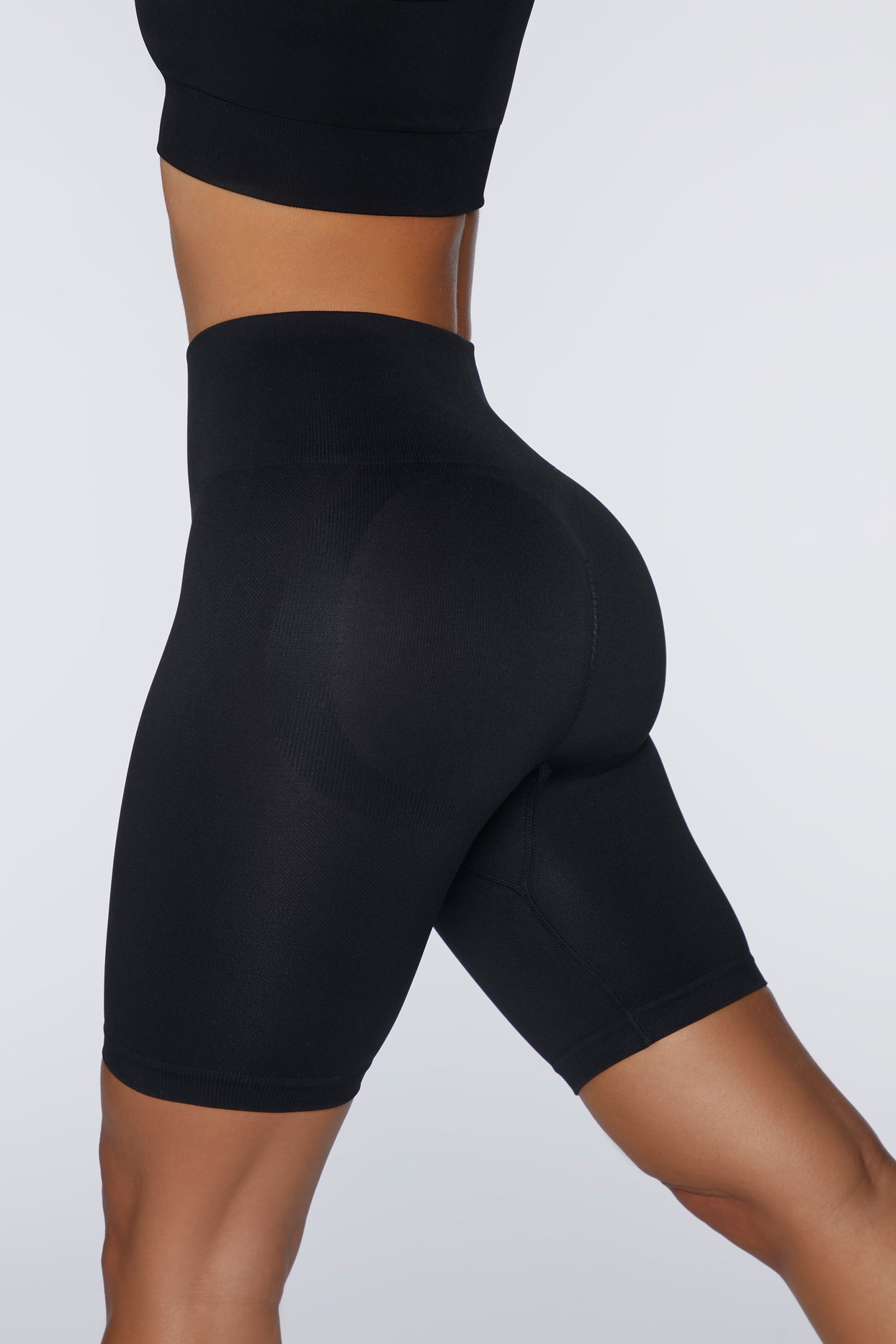 Push Yourself Seamless High Waisted Biker Shorts in Black | Oh Polly